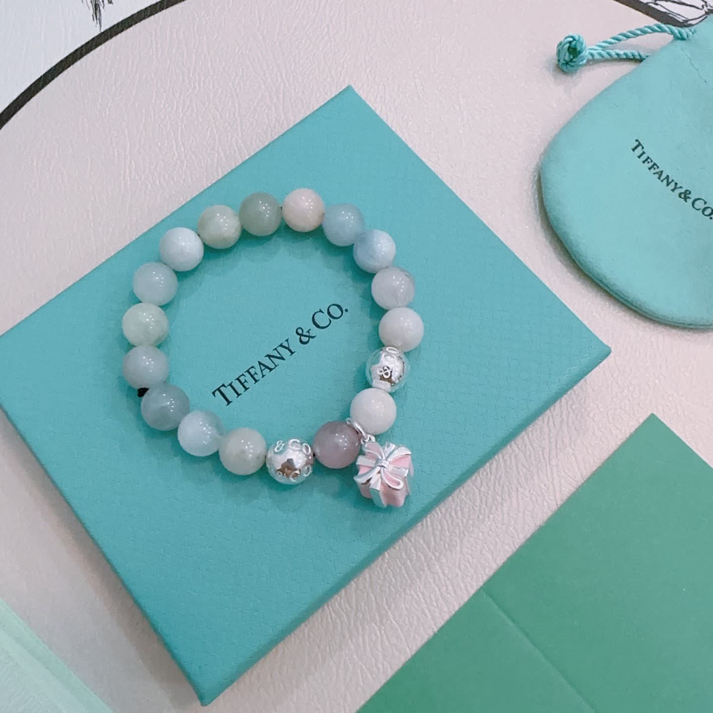 Tiffany & Co. Blue Agate Bead Bracelet with Sterling Silver Charms Tiffany & Co. Blue Agate Bead Bracelet with Sterling Silver Charms